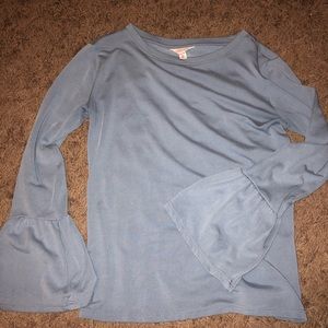 blue fitted long sleeve top with bell sleeves